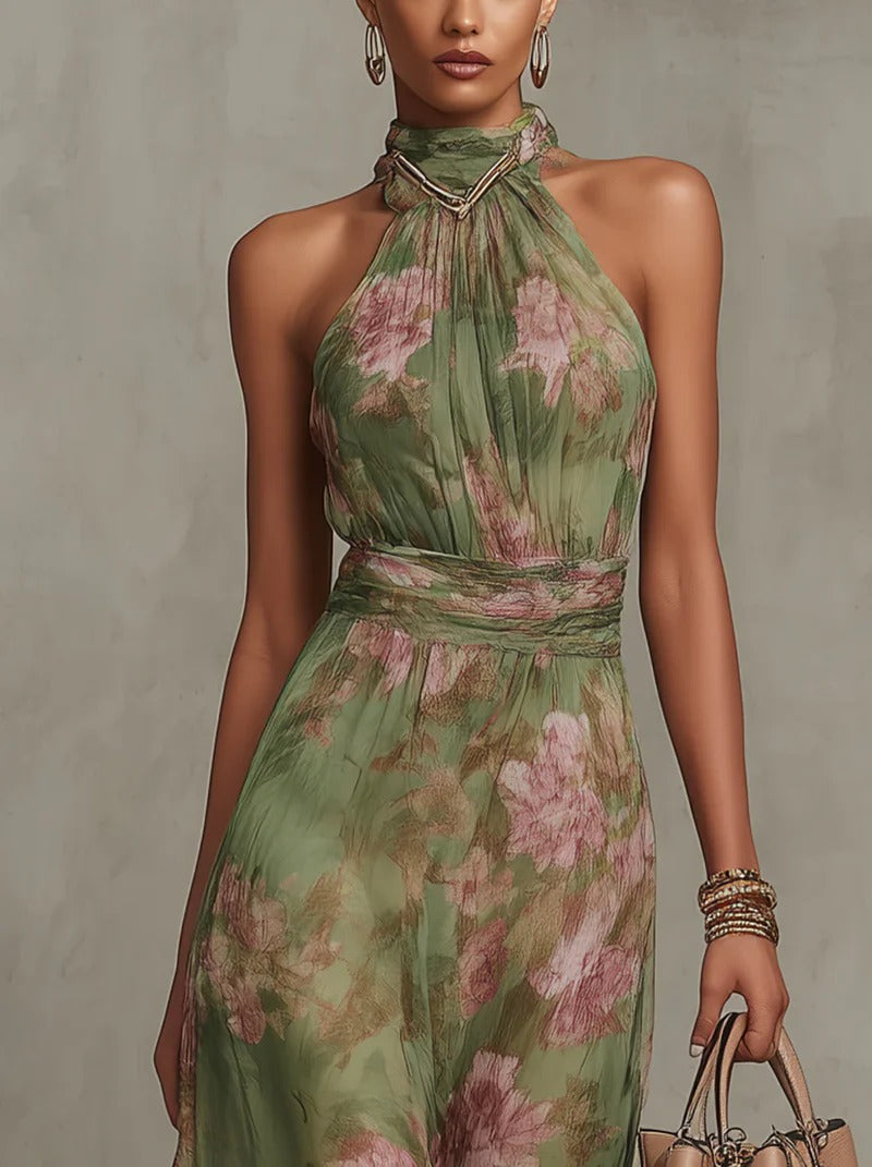 Serena - Vestido largo de gasa verde con estampado floral y escote halter.